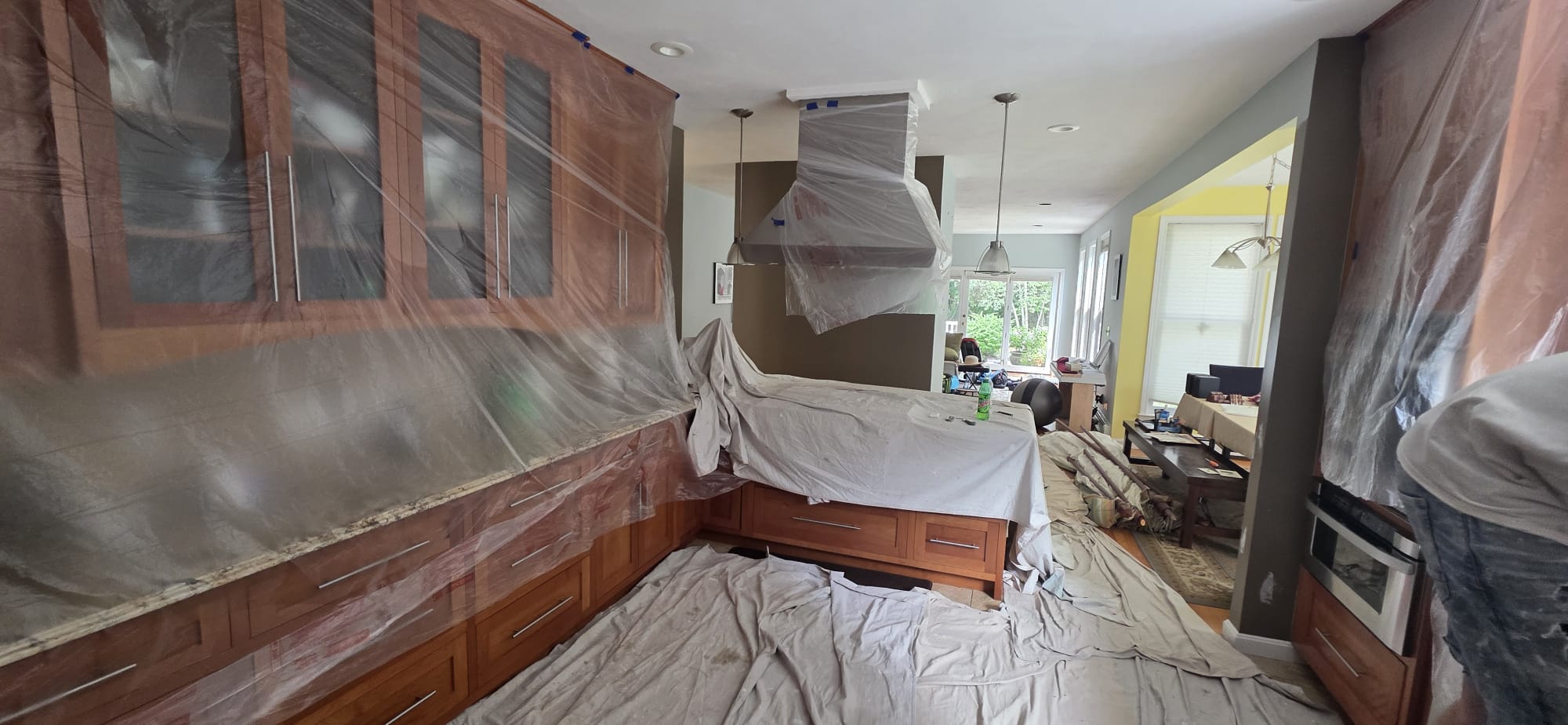 cabinet refinishing Chelmsford MA cabinet painting process kitchen during work
