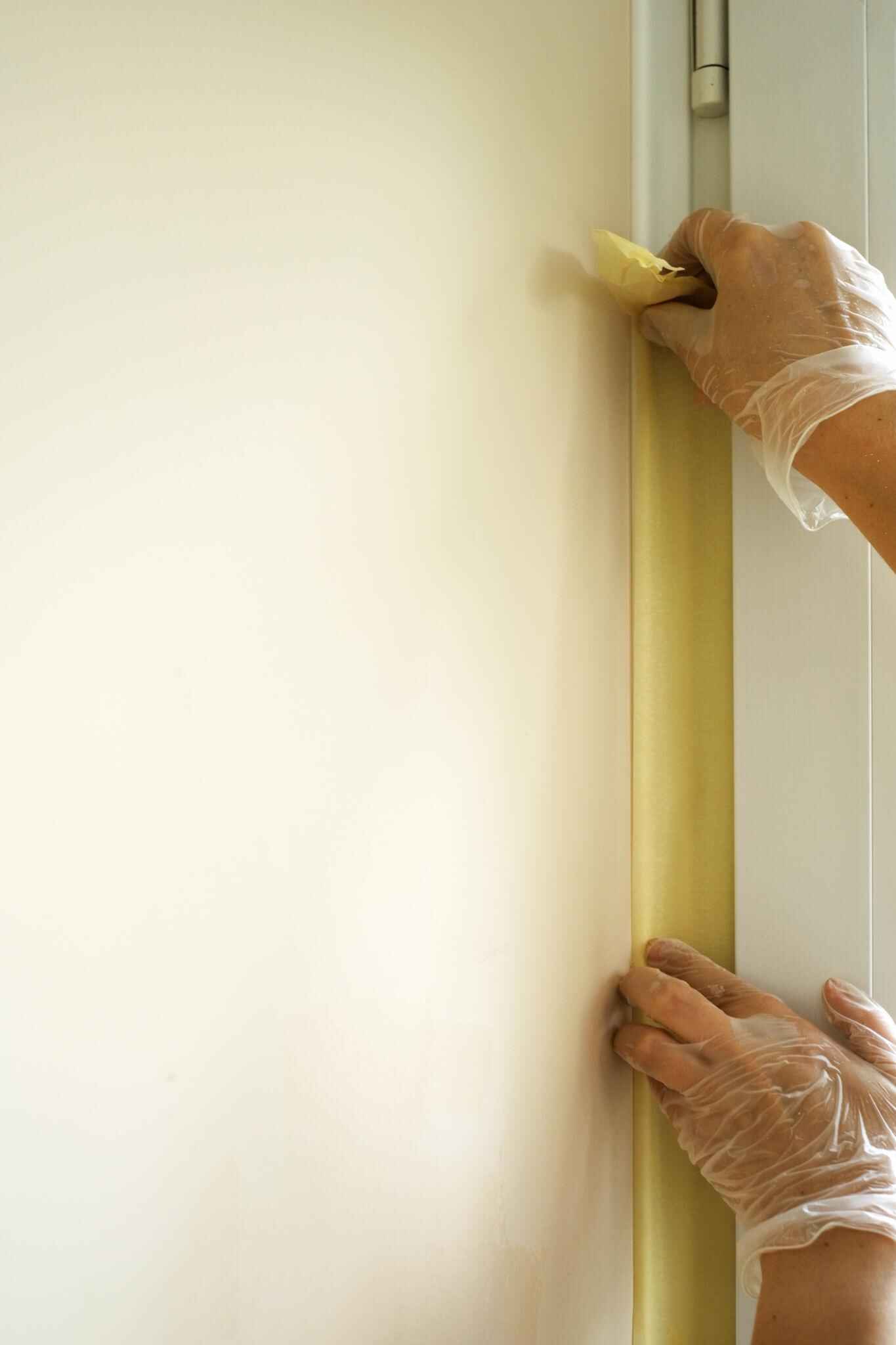 Yellow tape masking before interior painting