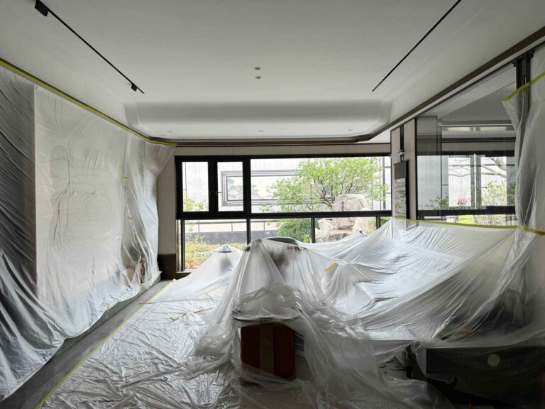 Room sealed in plastic sheeting before ceiling work