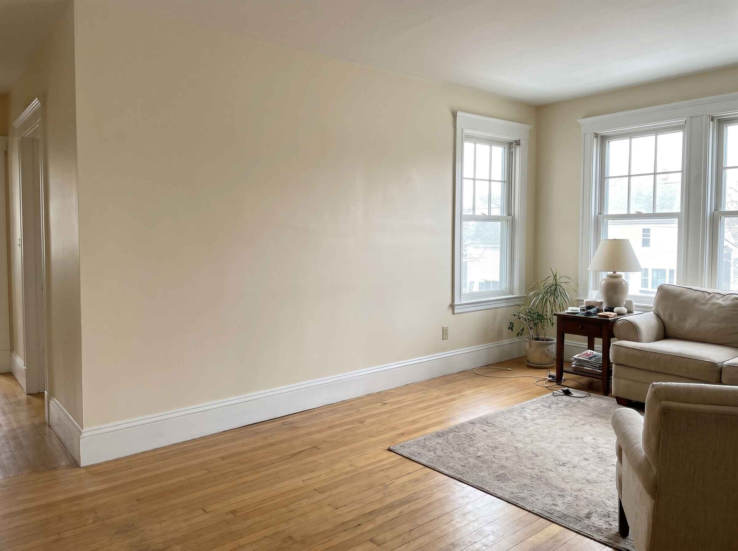 Interior painting by house painters Burlington MA, living room with soft warm beige walls